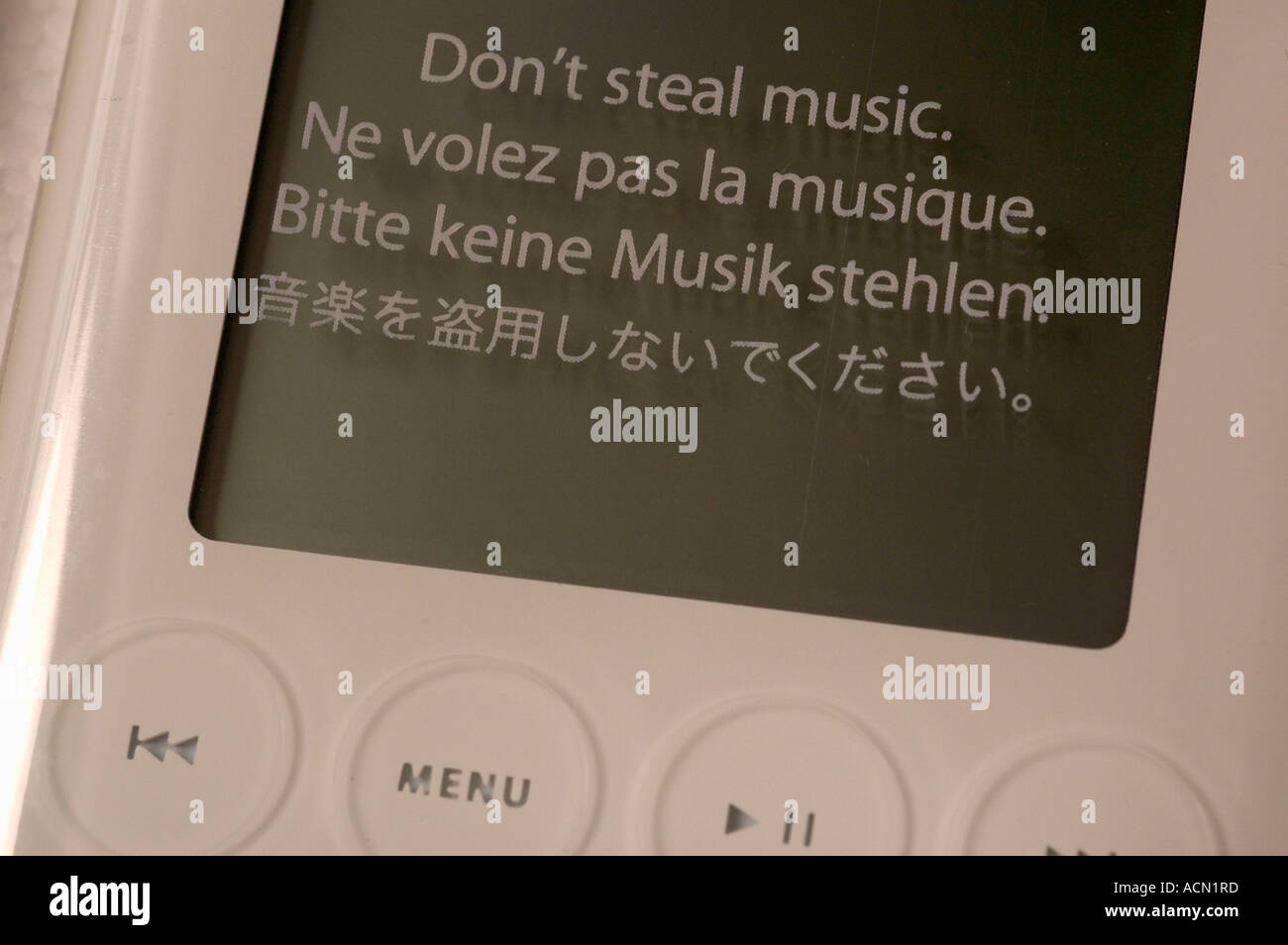 don`t steal music, advice on a plastic foil wrapped over a ipod. (c) by uli nusko, ch-3012 bern Stock Photo